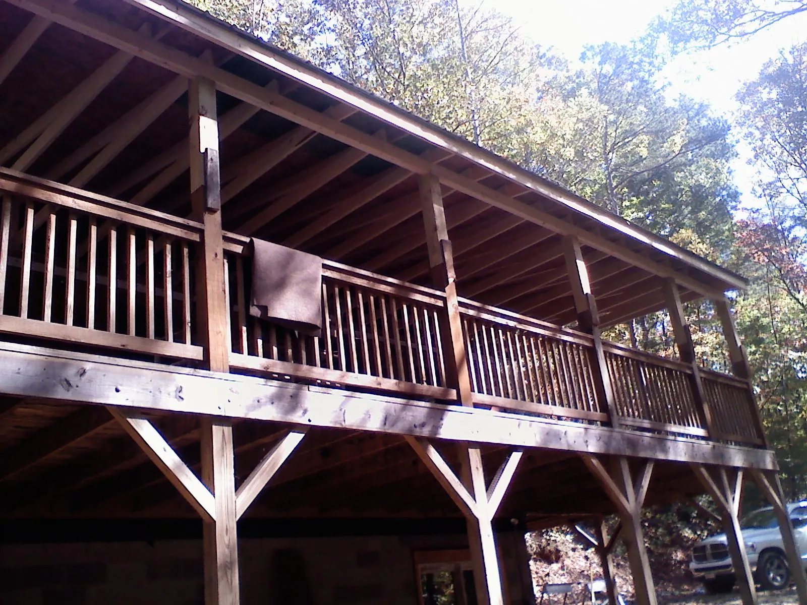 Timber framing under a new elevated porch and deck — Roof Leak Repair in Bethany Beach by Roofing Brothers